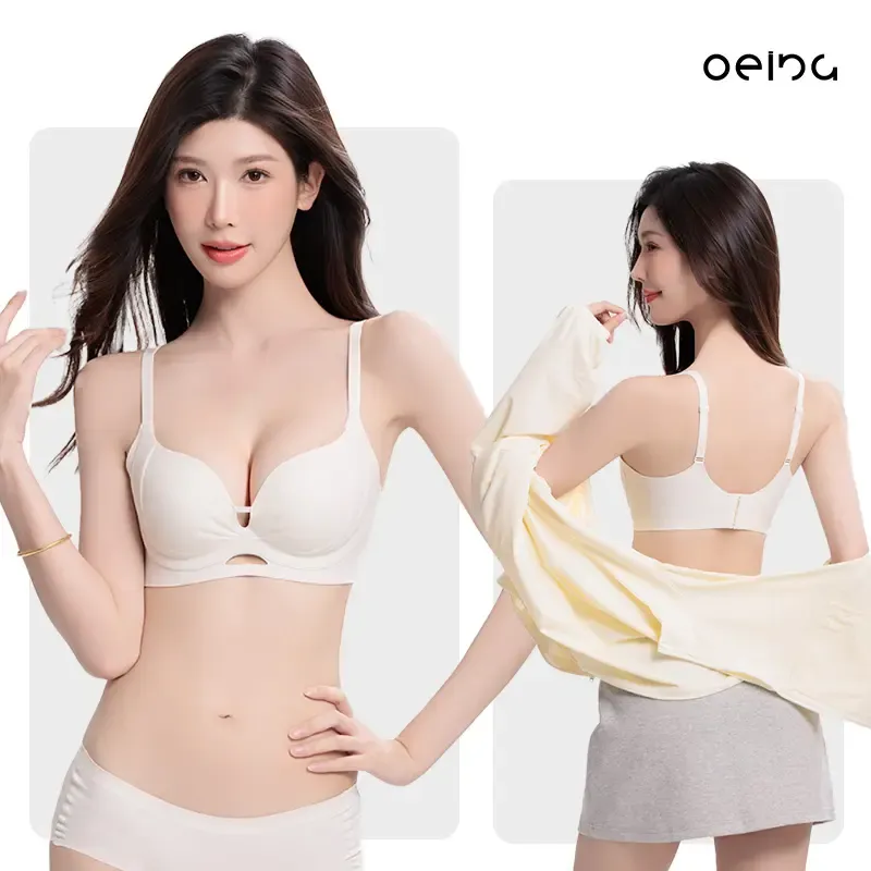 【OEING】 【ツーピース】シームレスフィットブラ - ファンデーションのカスタムシェードからインスピレーションを得たこのブラは、小さなバストのボリュームを高め、持ち上げて垂れを防ぎ、琥珀色のきらめきのシームレスフィットを特徴としています。#AD08